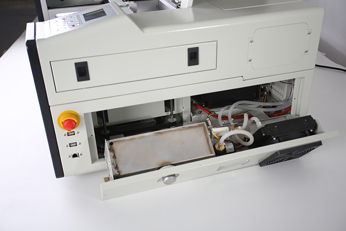 right panel opened, on the Aeon Mira CO2 Desktop Laser Cutting Machine